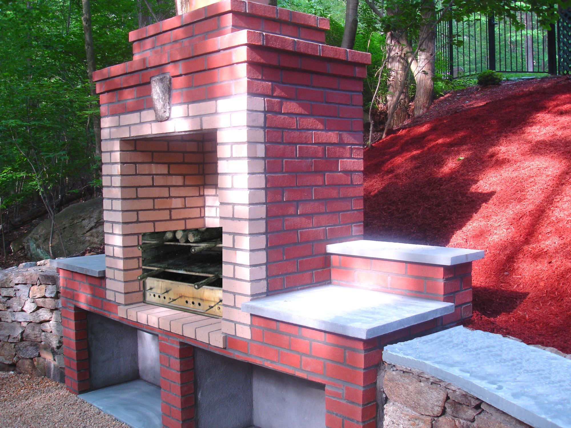 Huge outdoor stone and brick BBQ