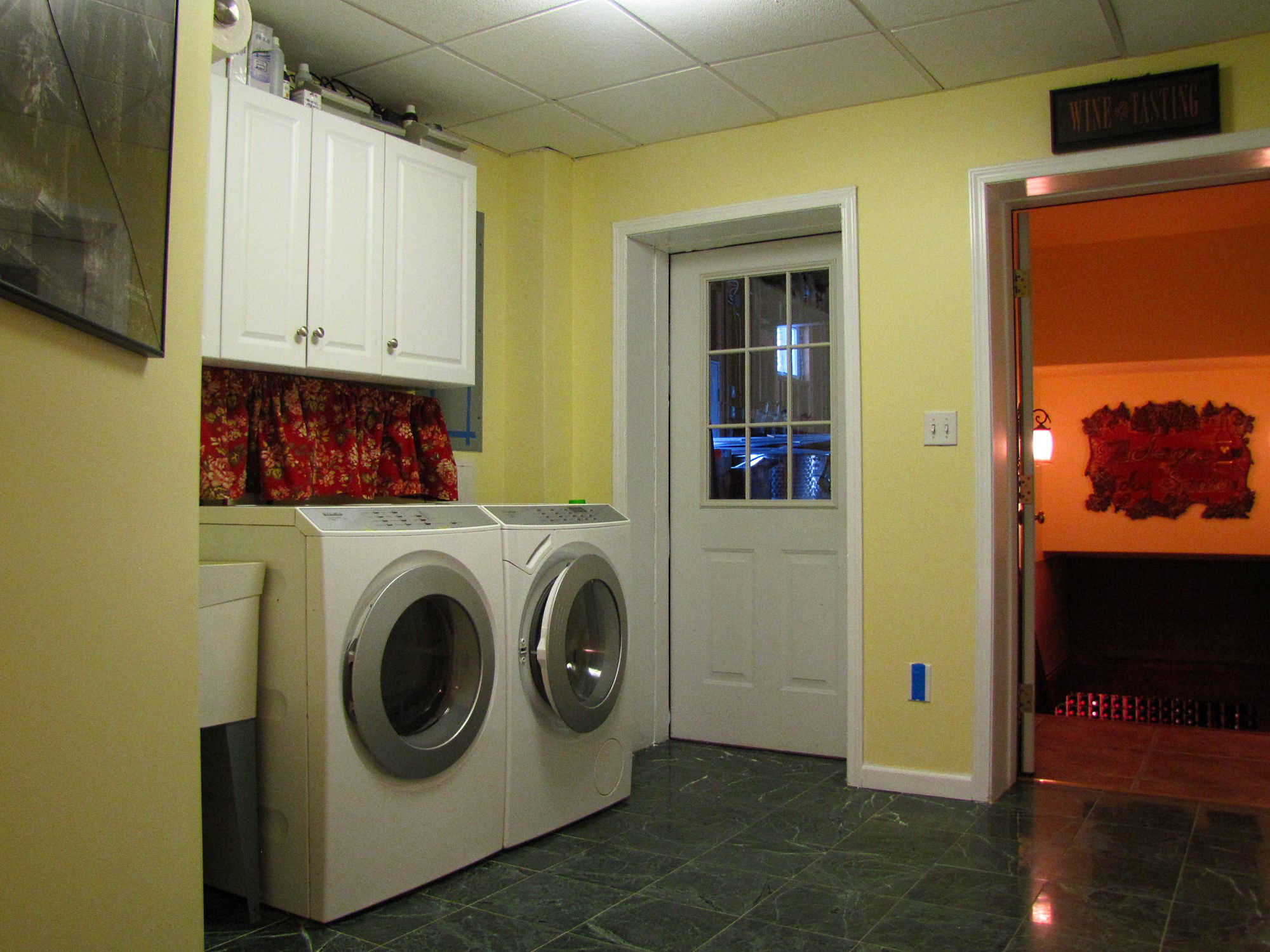 Washer and dryer room one of two in the home